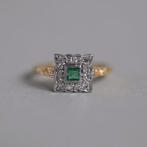 Aesthetic 18ct gold and platinum emerald and diamond cluster ring, c.1940s