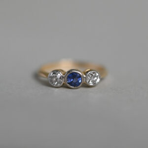 Classic 18ct gold sapphire and diamond three stone ring