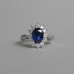 Classic platinum sapphire and diamond cluster ring