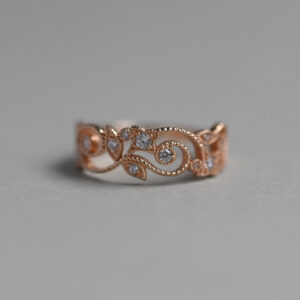 Contemporary 14ct rose gold diamond pierced foliate band ring