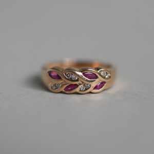 Contemporary 9ct gold ruby and diamond wide leaf band ring