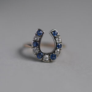 Victorian 9ct gold old cut diamond and sapphire horseshoe ring