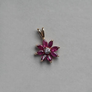 Pretty 9ct gold marquise ruby and mini diamond flower pendant