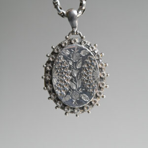 Antique Victorian sterling silver starburst frame floral locket and chain necklace
