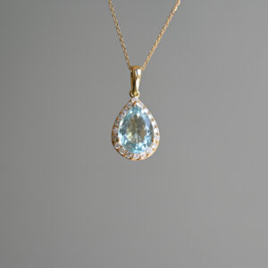 Classic 9ct gold contemporary pear cut aquamarine and diamond pendant necklace