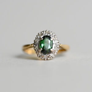 Classic 18ct gold green tourmaline and diamond cluster ring