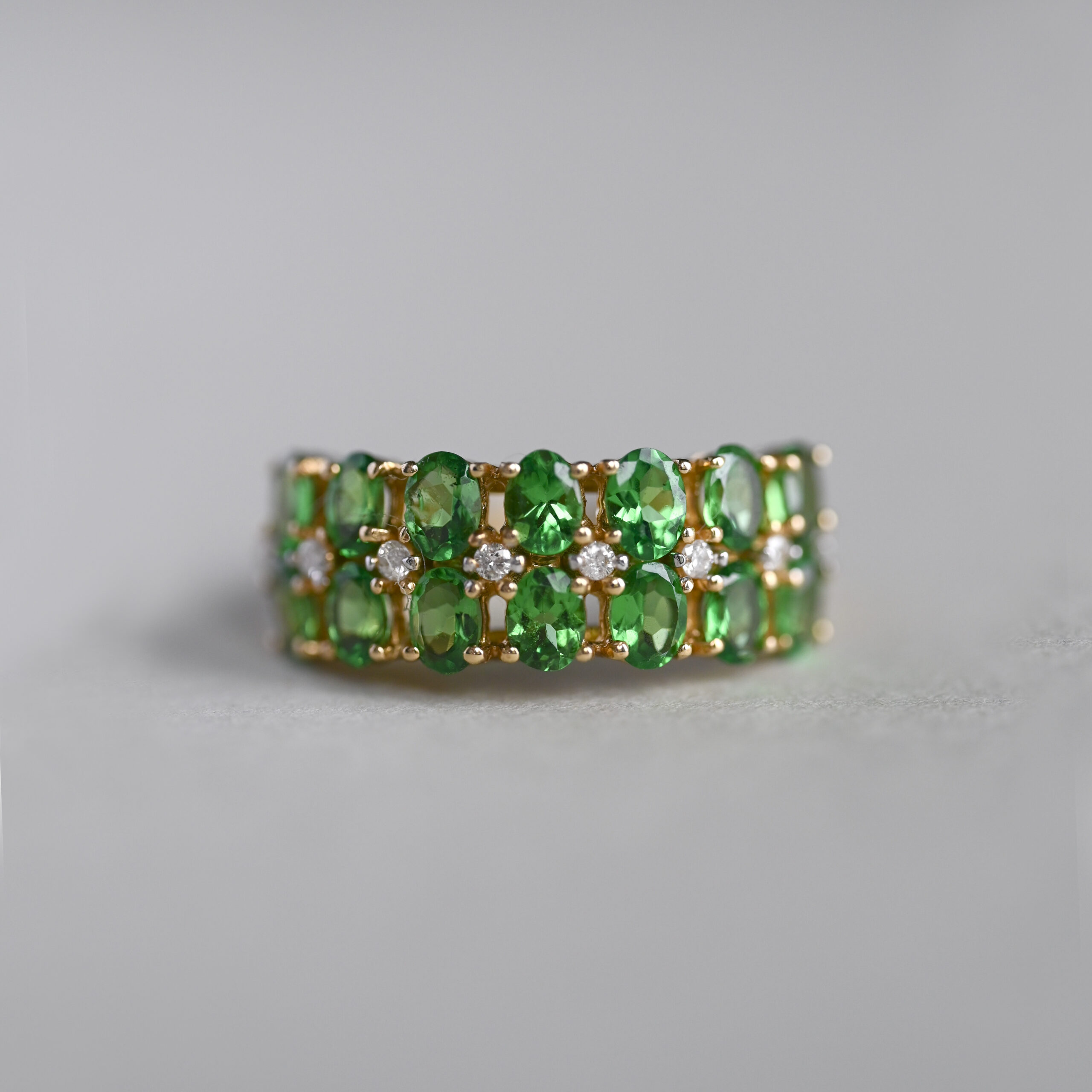 Aesthetic 9ct gold contemporary tsavorite and mini diamond ring