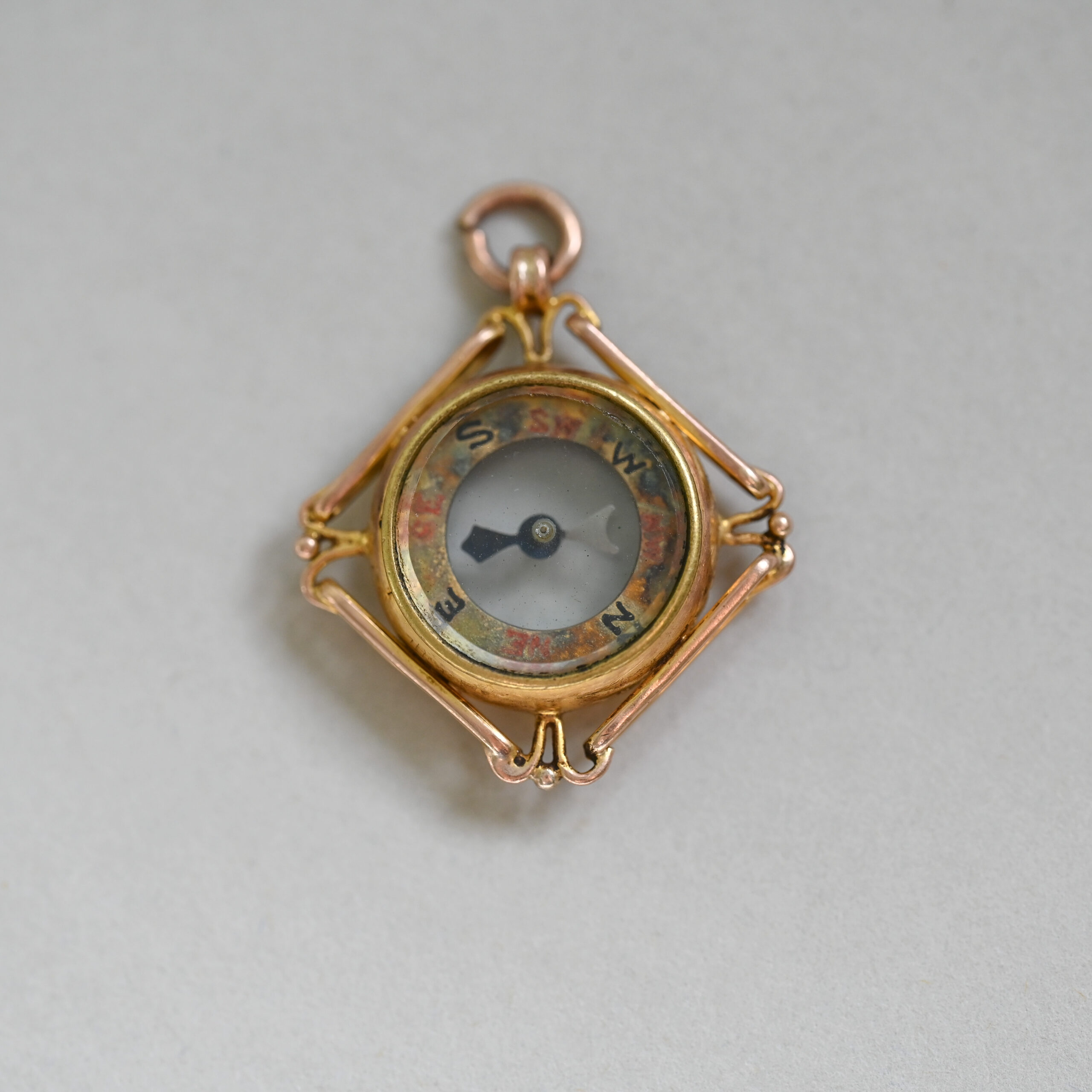 Art Deco 9ct gold compass pendant charm, Chester, 1929