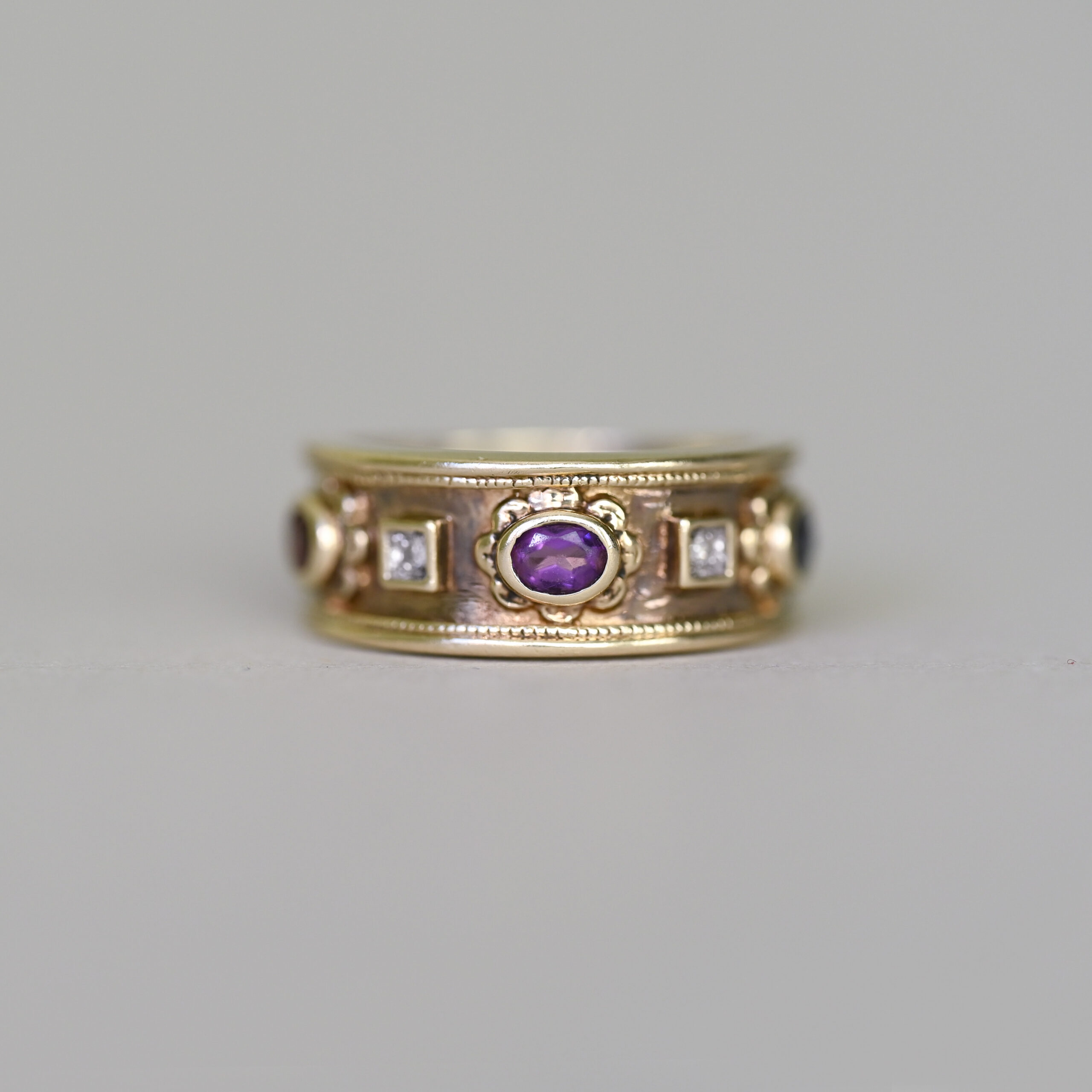 Contemporary 9ct gold multi gemstone and mini diamond Byzantine design band ring, heavy